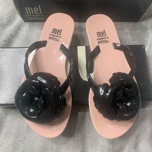 Pink with black flower Mini Melissa flip flops